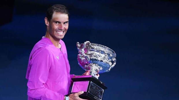 Rafael Nadal poses with Australian Open trophy
