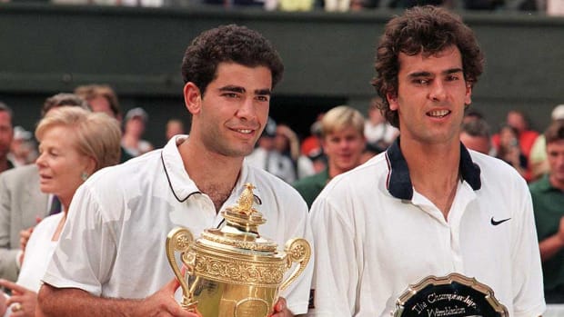 Champion Pete Sampras and Wimbledon runner-up Cedric Pioline