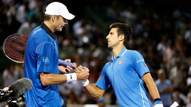 John Isner and Novak Djokovic