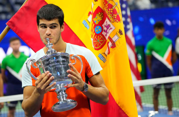 Carlos Alcaraz with US Open title after historic final win