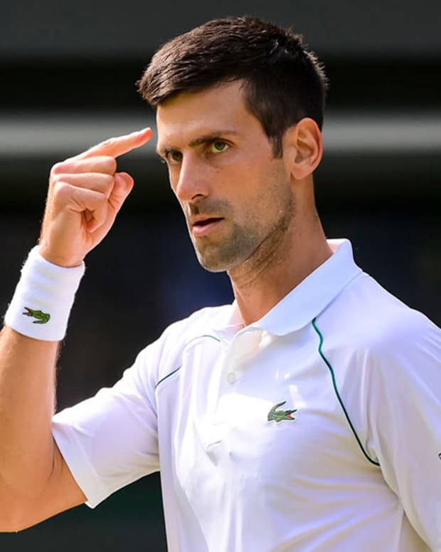 Novak Djokovic reacts at Wimbledon 2021