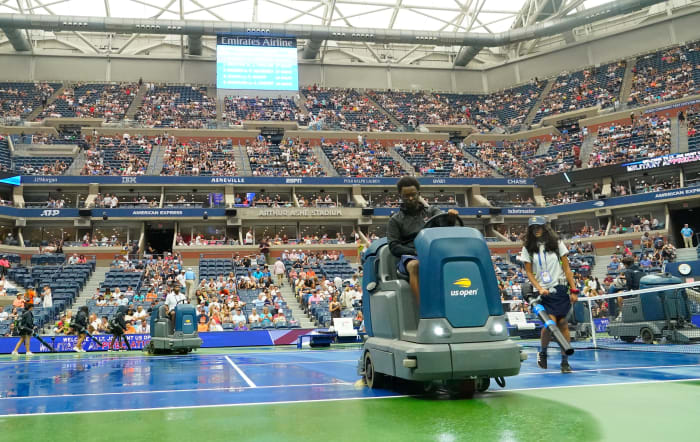 The counrt inside Arthur Ashe wet from rain at US Open