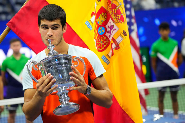 Carlos Alcaraz with US Open title after historic final win