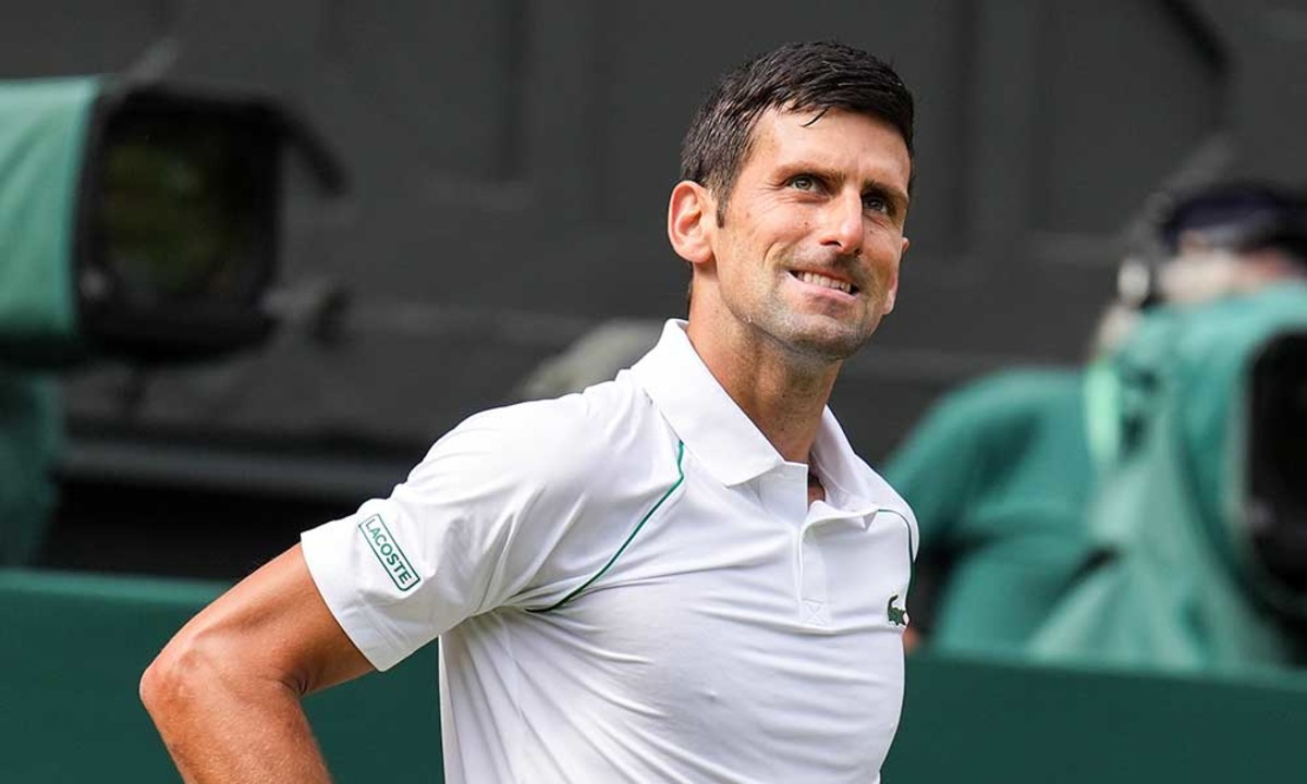 Novak Djokovic looks on at Wimbledon ahead of Jannik Sinner clash