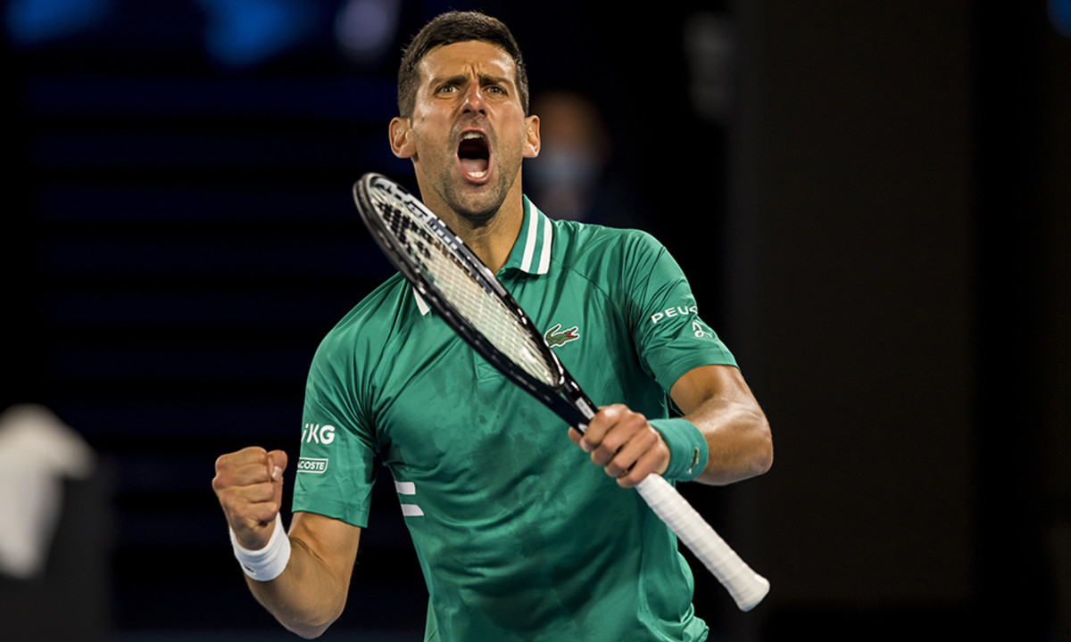 Novak Djokovic celebrates Australian Open