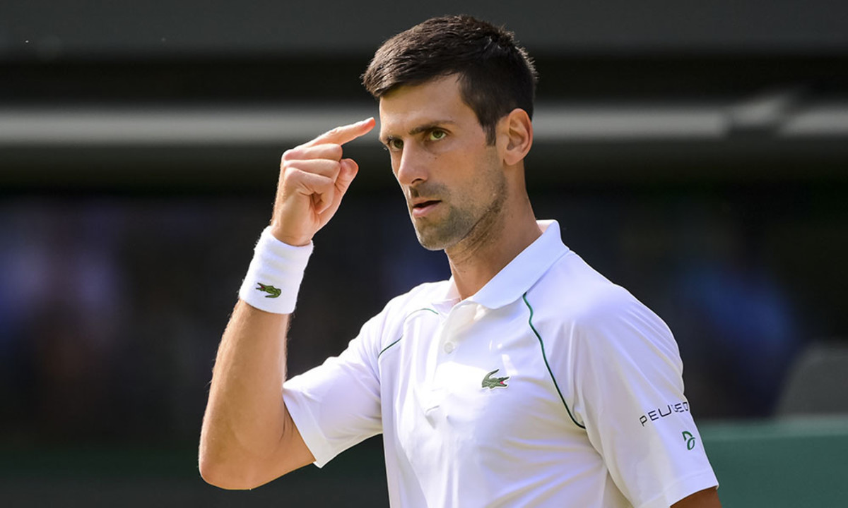 Novak Djokovic reacts at Wimbledon 2021