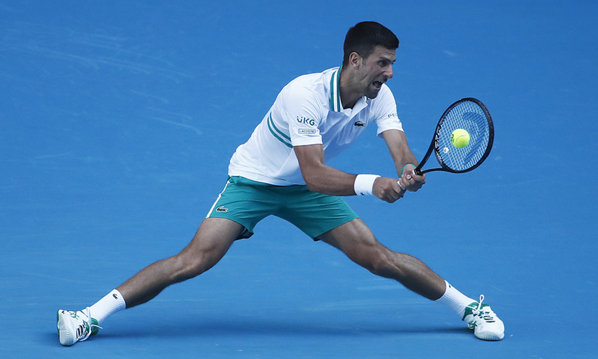 Novak Djokovic sliding Australian Open