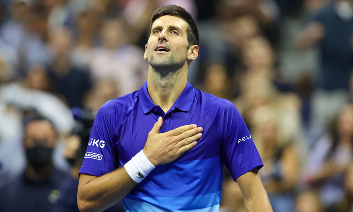 Novak Djokovic hand on heart at US Open