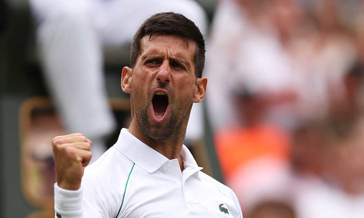 Novak Djokovic celebrates Wimbledon