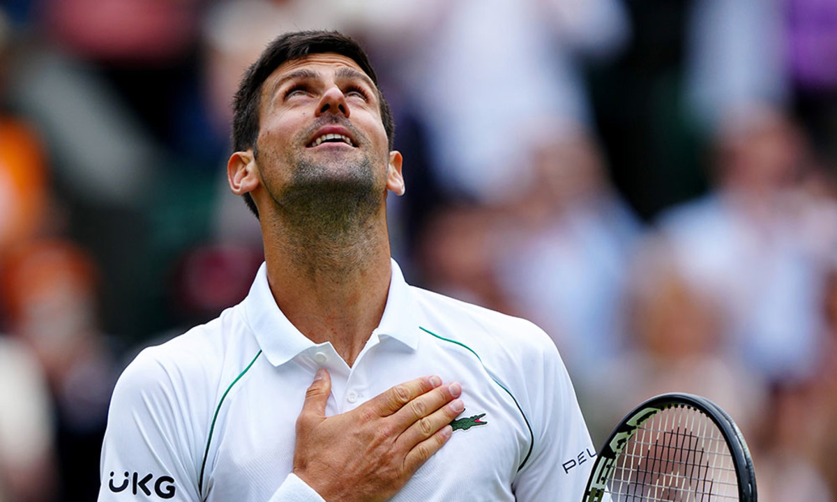Novak Djokovic hand on heart Wimbledon