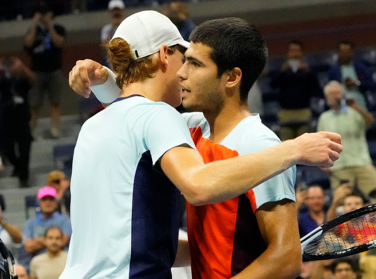 Carlos Alcaraz and Jannik Sinner embrace after US Open epic